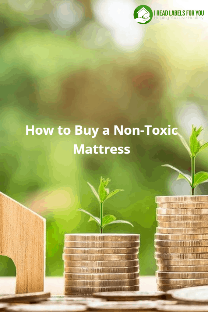 How to buy a non-toxic mattress for you. A picture of three stacks of coins and three stems of grass growing out of them.