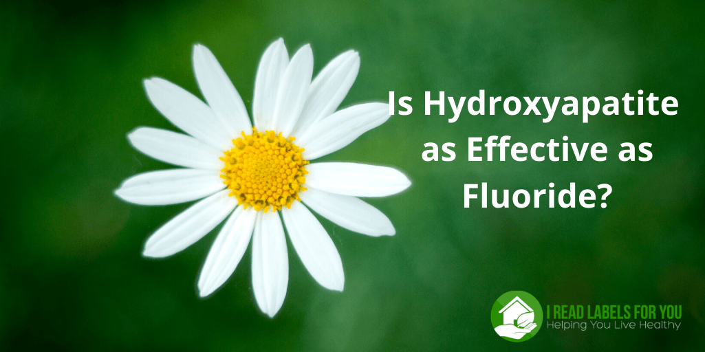 Is Hydroxyapatite as Effective as Fluoride. A picture of a daisy on the green background.