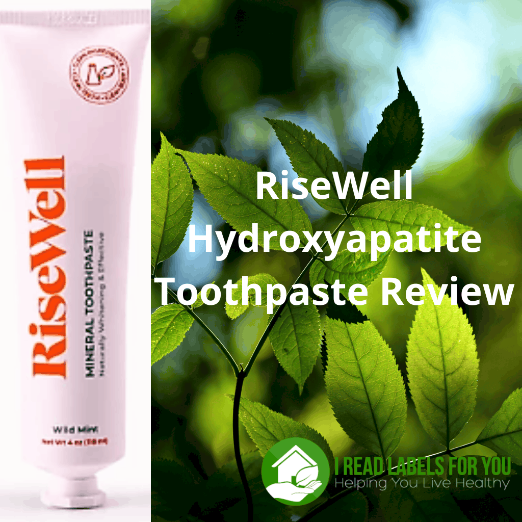 RiseWell Hydroxyapatite Toothpaste Review. A photo of Risewell toothpaste tube with green leaves in the background.