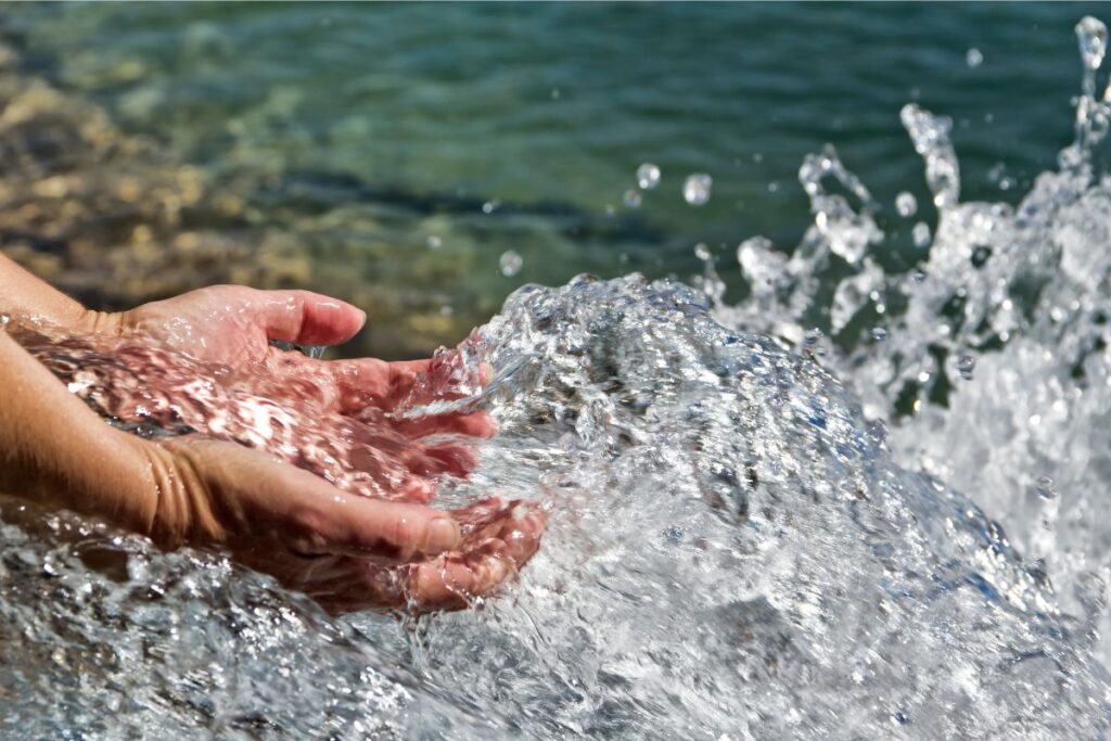 hands in clean water